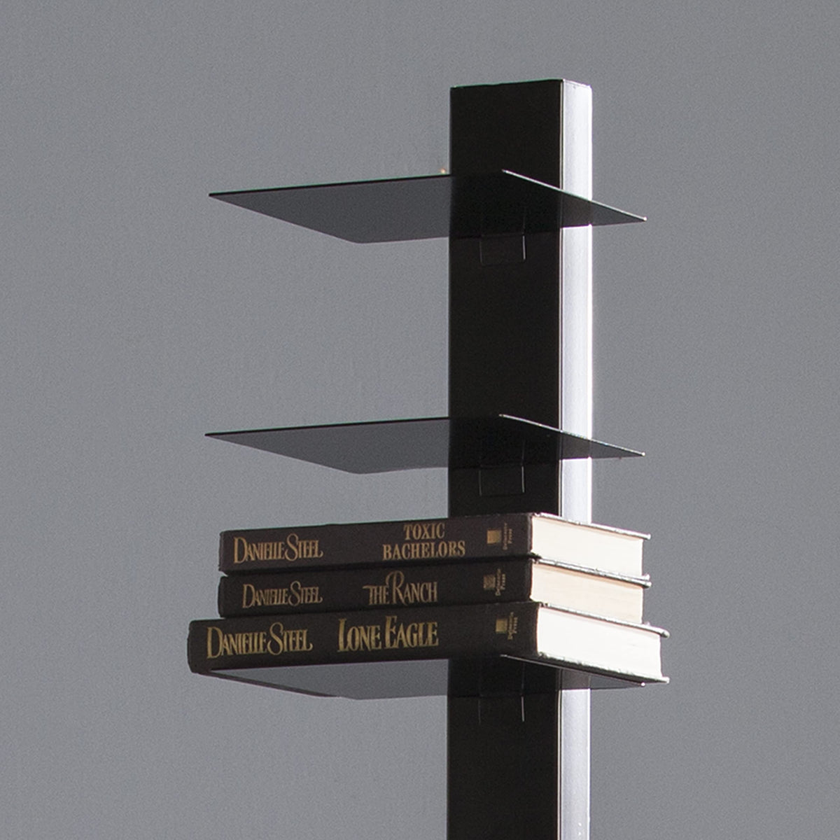 Black 12 Shelf Metal Book Tower A526813
